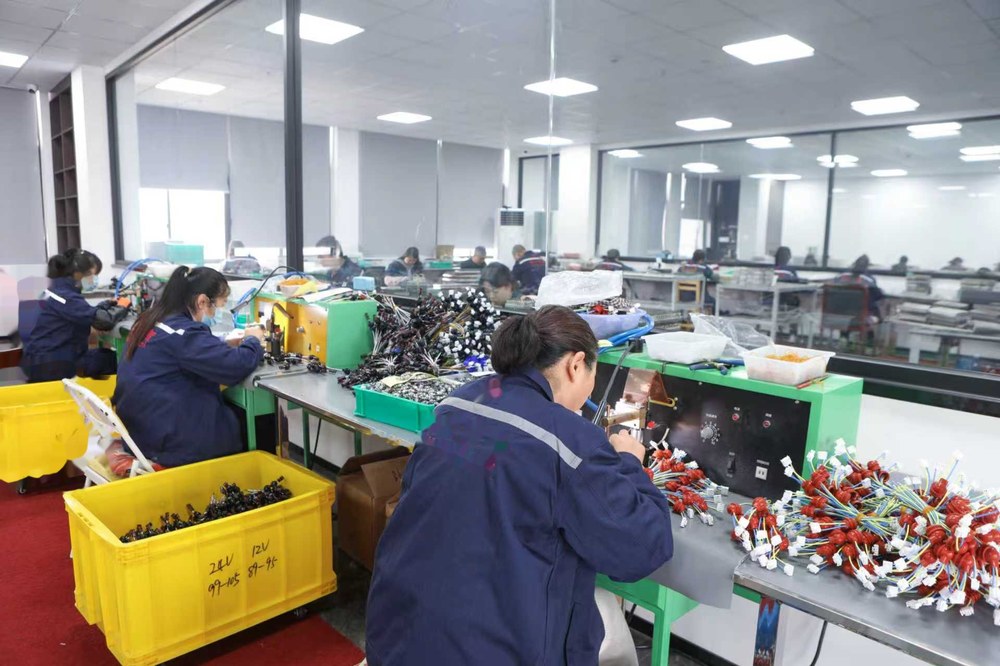 Glow plug assembly line