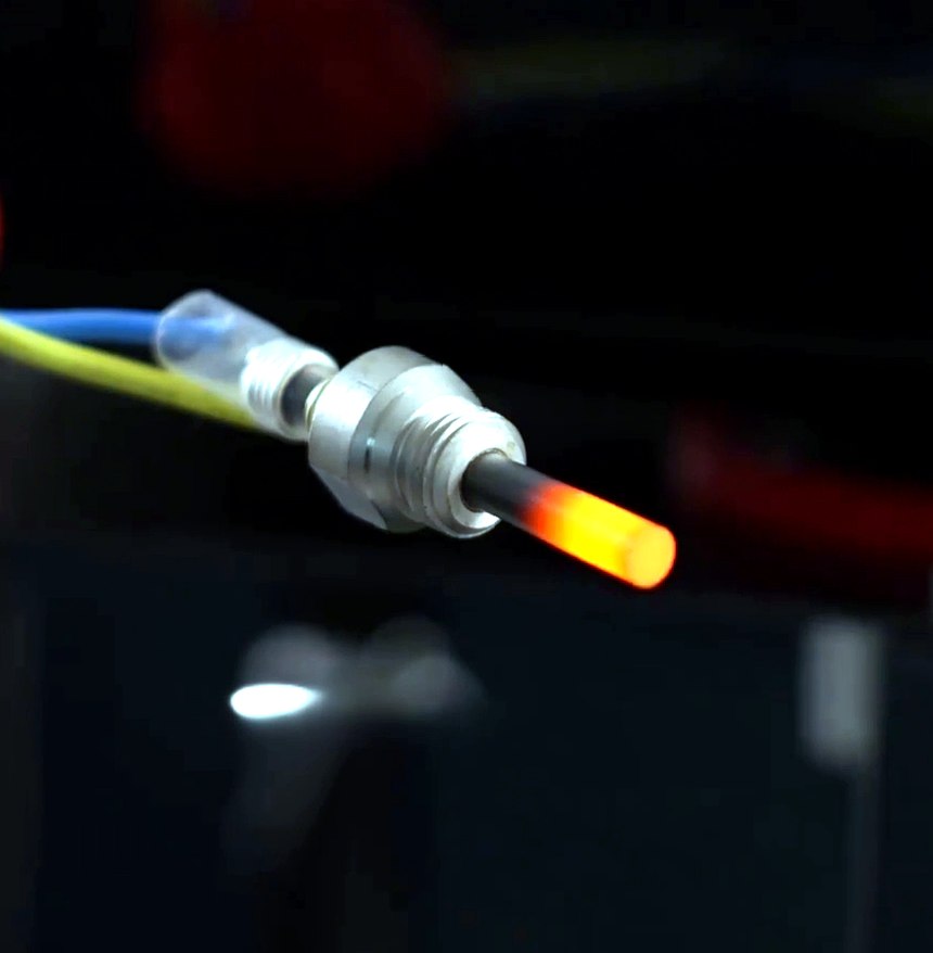 Silicon nitride pin glowing red-hot in freezing test